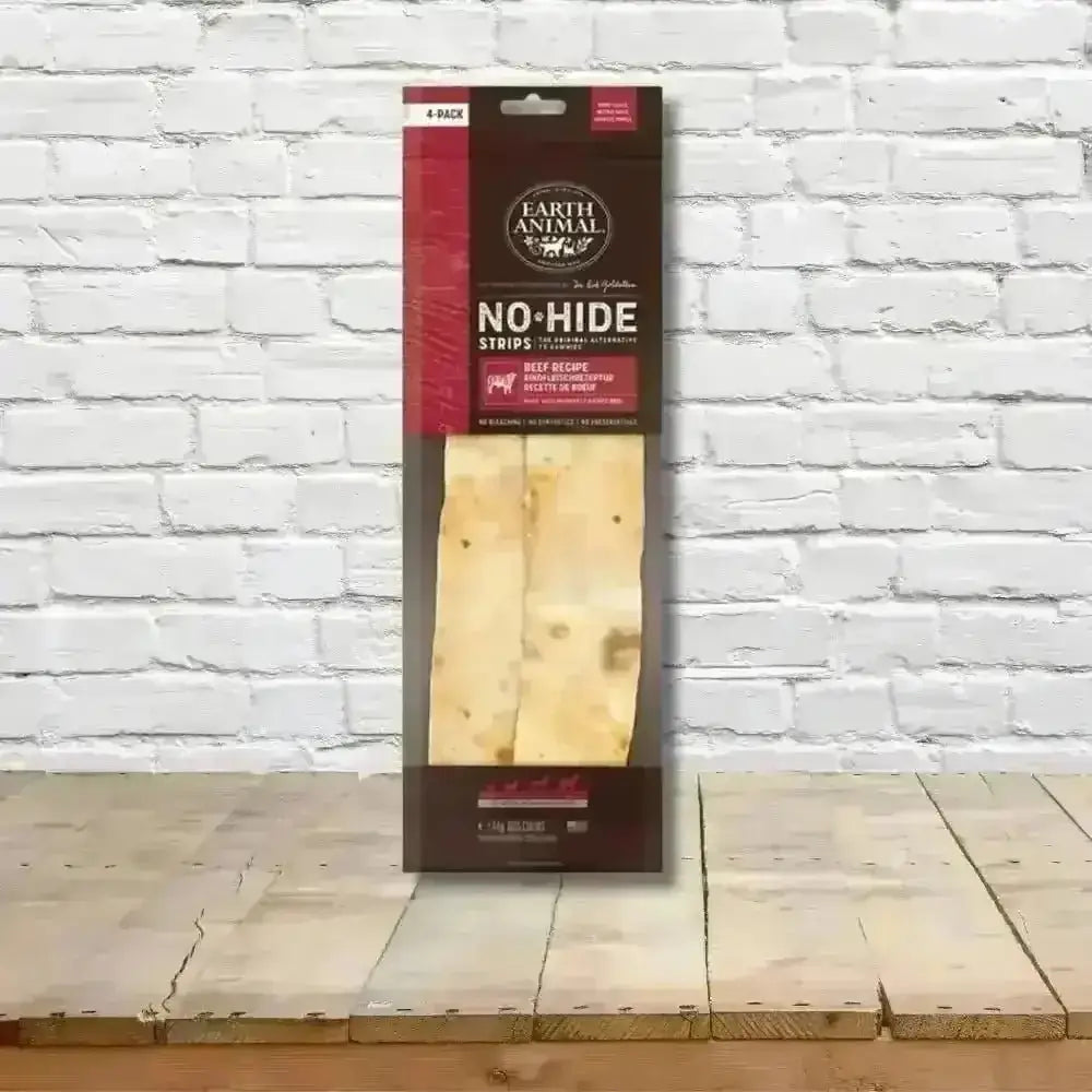 Earth Animal No Hide Beef Strips 4pk 44g packaging showing tasty chew experience and brown rice flour