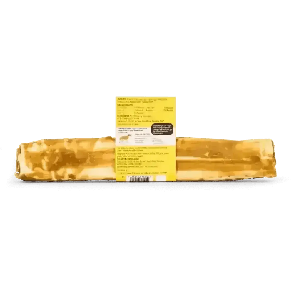 Cheese bar with yellow rind and white interior wrapped in plastic, ideal as a peanut butter chew for dogs