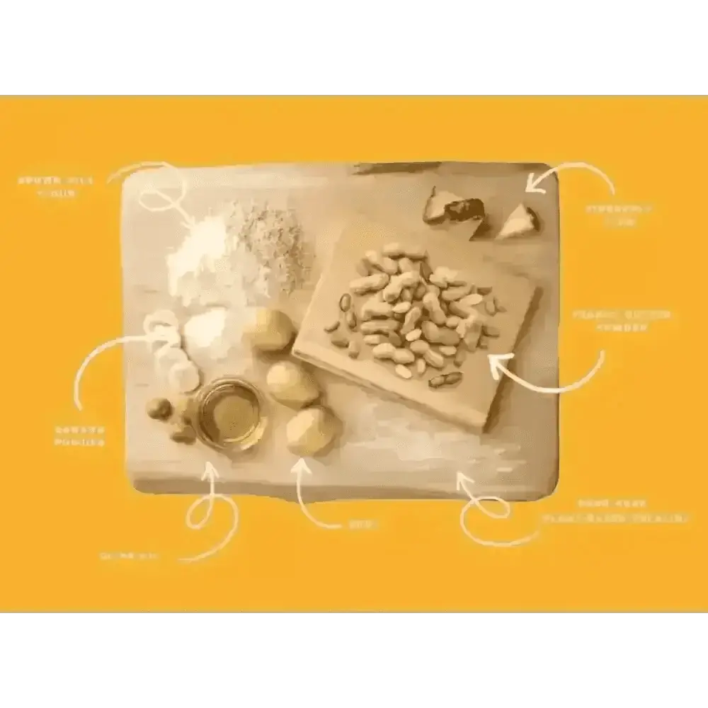 Wooden cutting board with peanuts and pineapple slices for Earth Animal No-Hide peanut butter dog stix