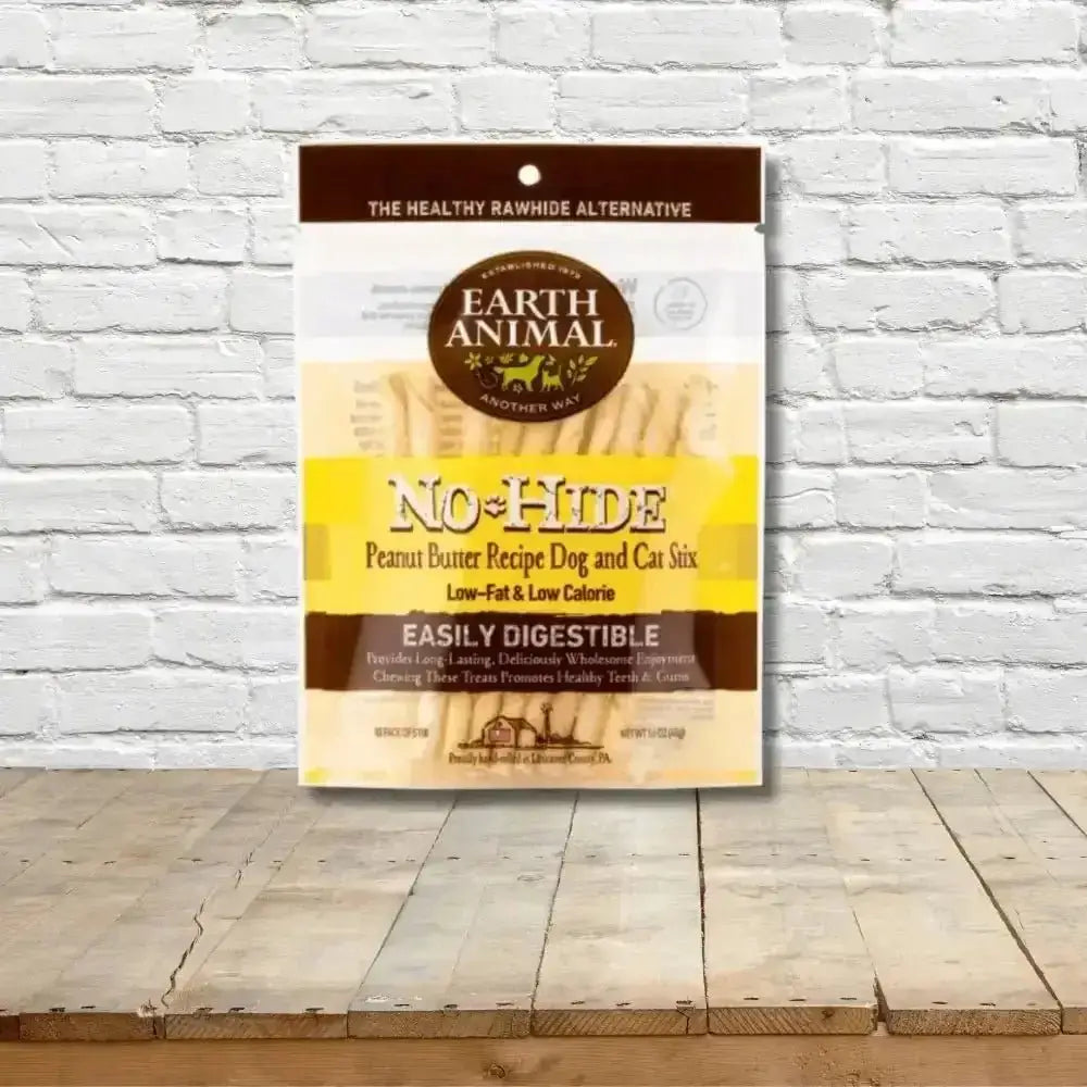 Earth Animal No-Hide Peanut Butter Dog Stix treat bag featuring dog and cat safe treats