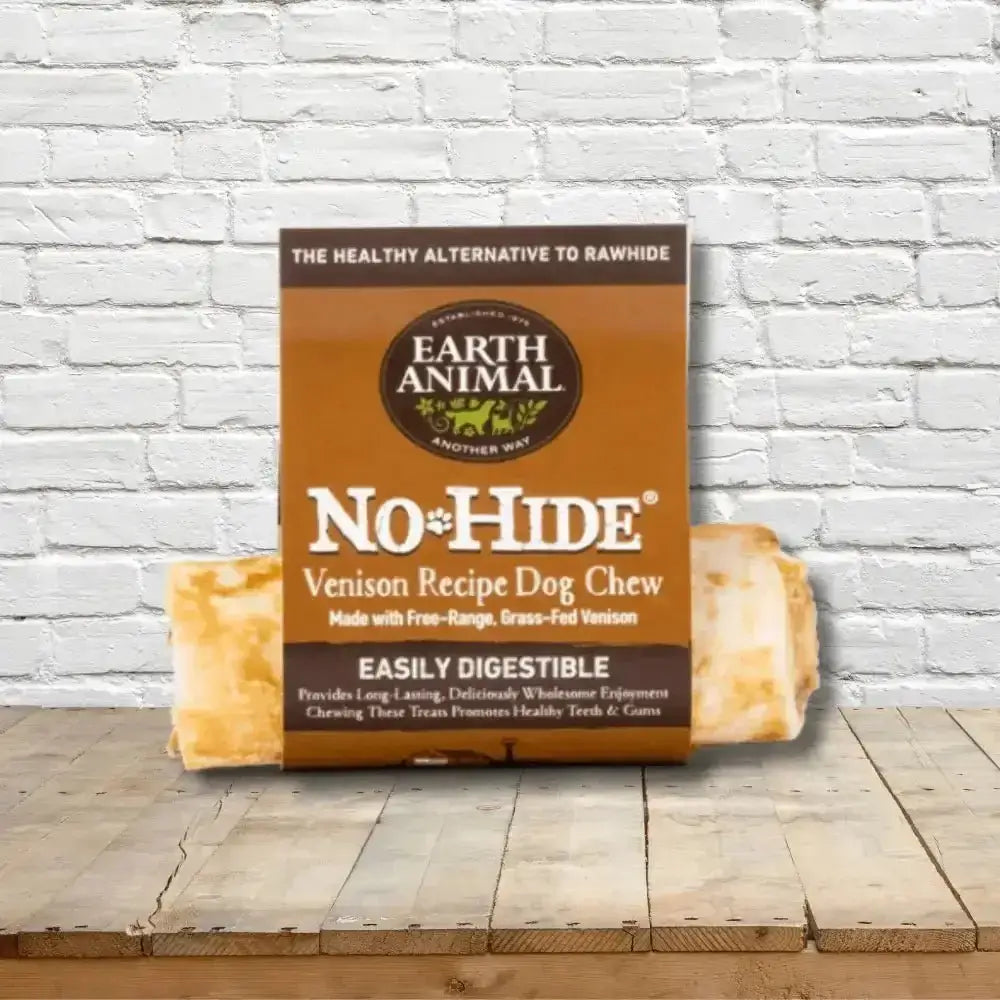 Earth Animal No-Hide Venison Chew for dogs in brown and white packaging with green logo