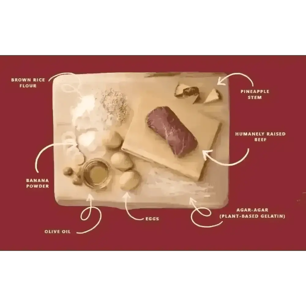 Wooden cutting board with ingredients for Earth Animal No-Hide Wholesome Beef Chew