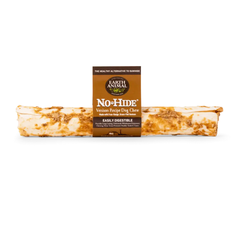 Earth Animal No-Hide Venison Chew for dogs on a textured brown and white surface