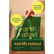 Earth Rated Poop Bags on a large roll with green design and tissue-style dispenser