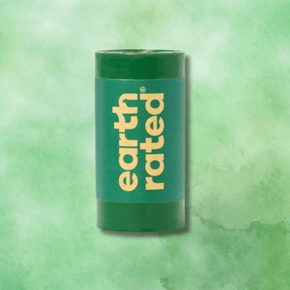 Earth Rated green cylindrical pet waste bag dispenser for unscented 15-bag rolls