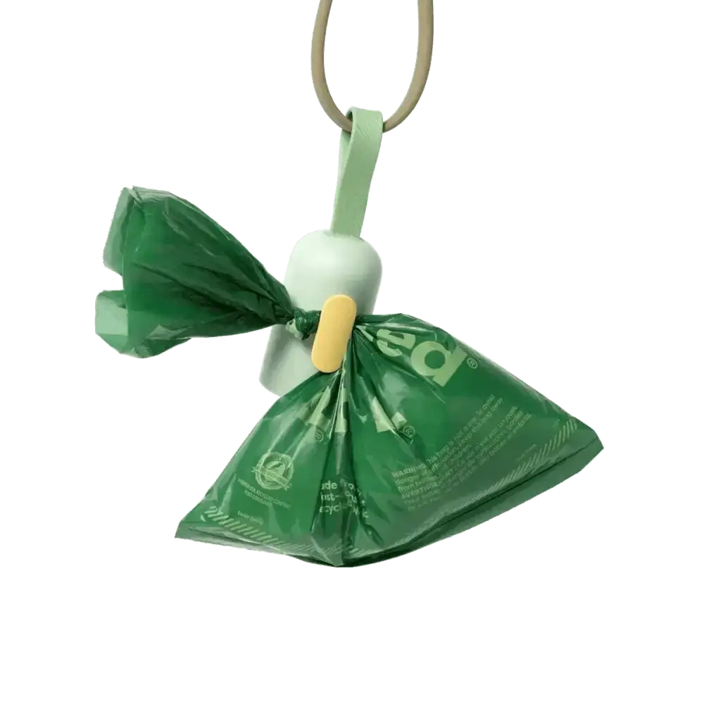 Earth Rated green plastic pet waste bag dispenser with white handle