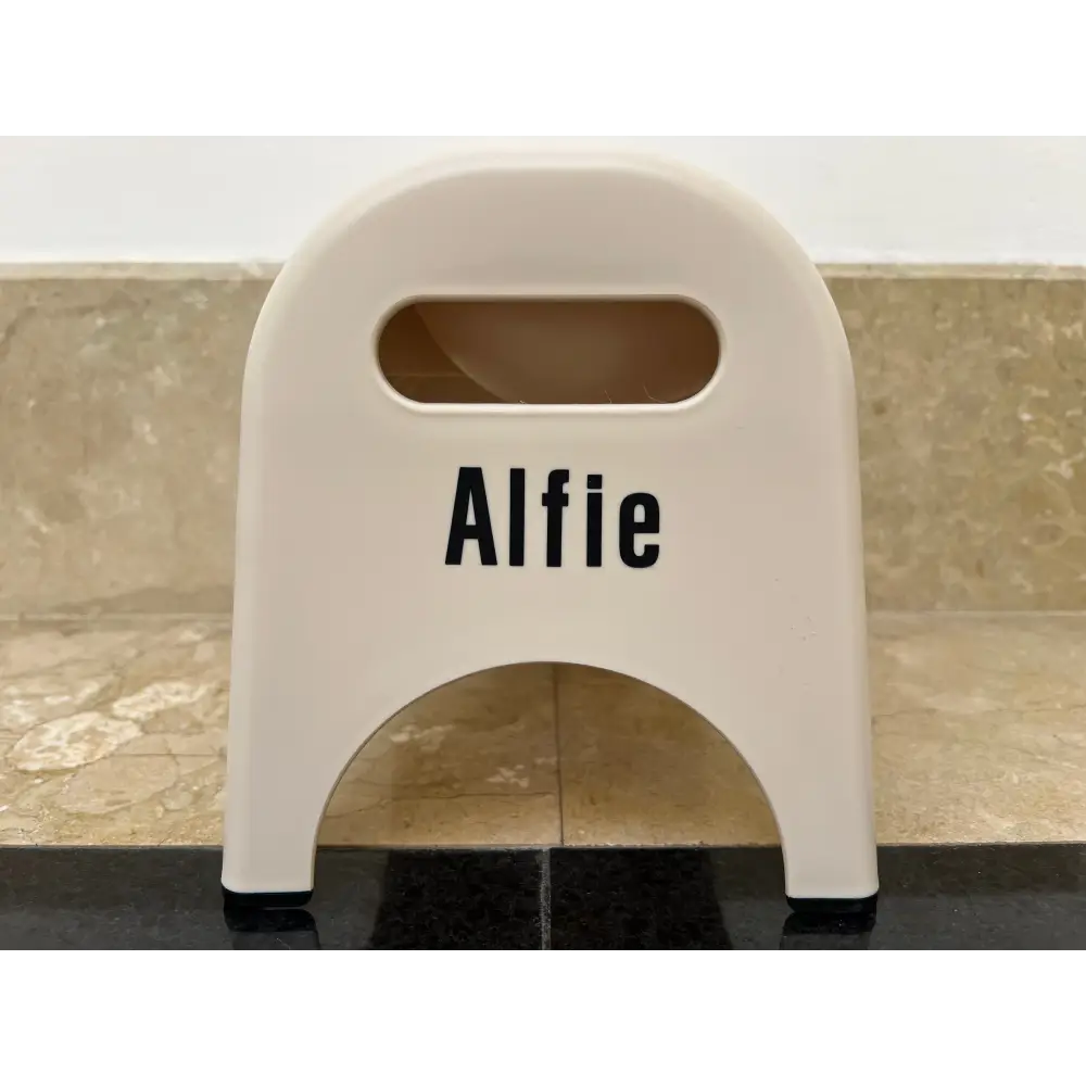 Beige EasyEat 2.0 cream plastic step stool with Alfie nameplate