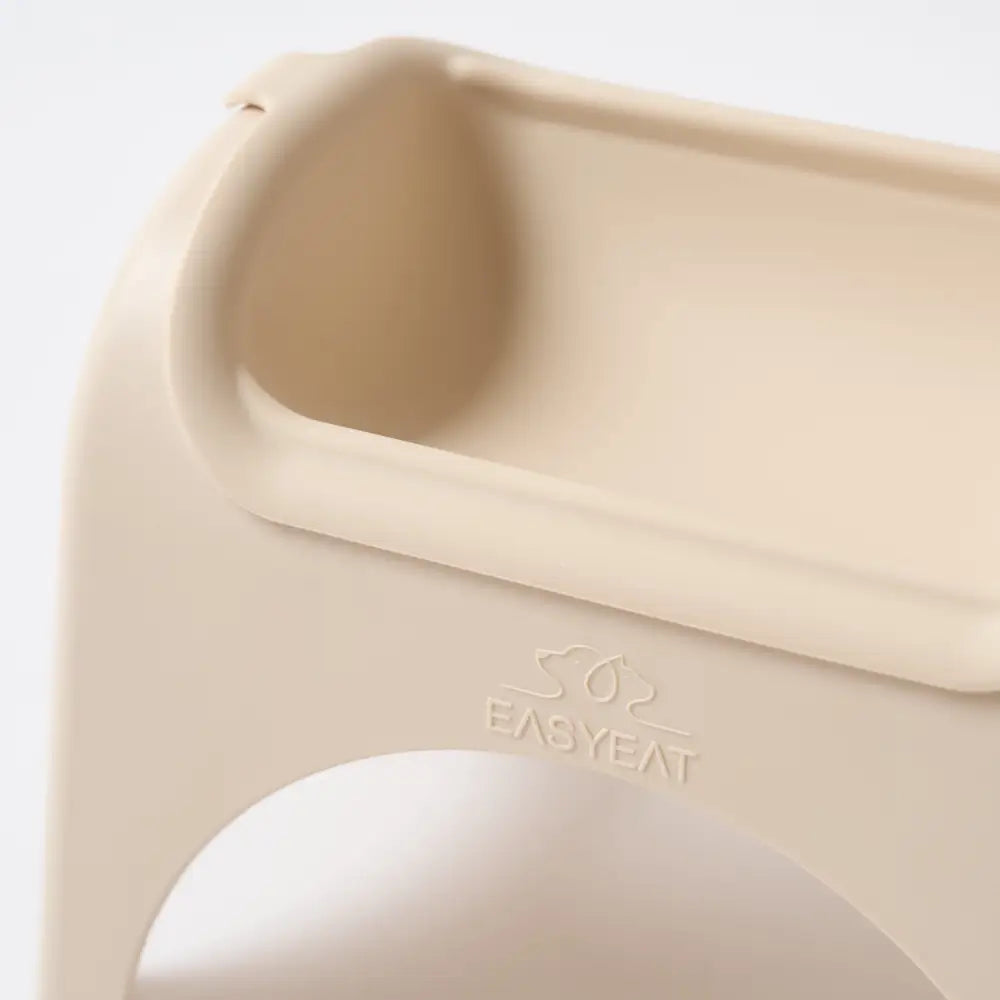 EasyEat 2.0 beige silicone baby food container with ergonomic design