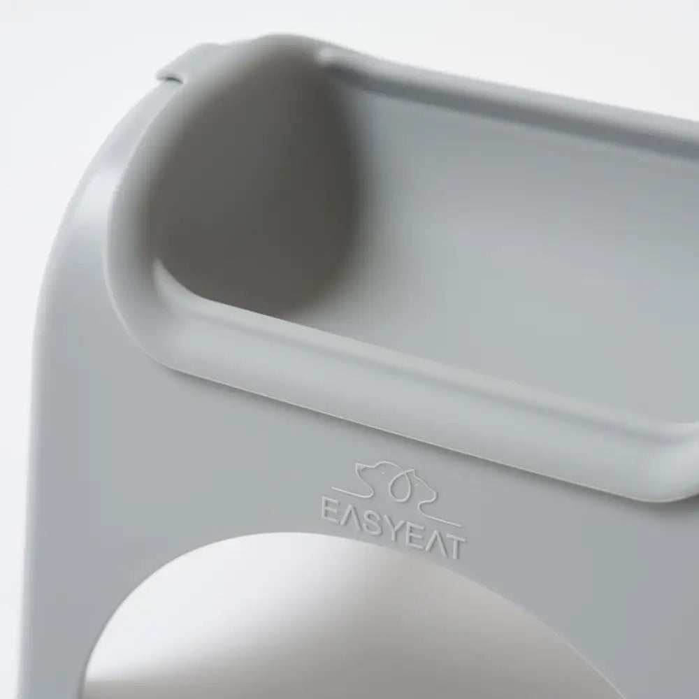 Gray EasyEat 2.0 silicone baby food container with ergonomic design