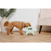 Mint green EasyEat slow feeder plastic step stool with handle cutout