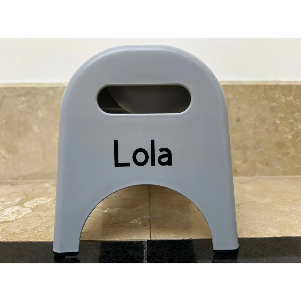 Gray plastic EasyEat slow feeder step stool with Lola handle