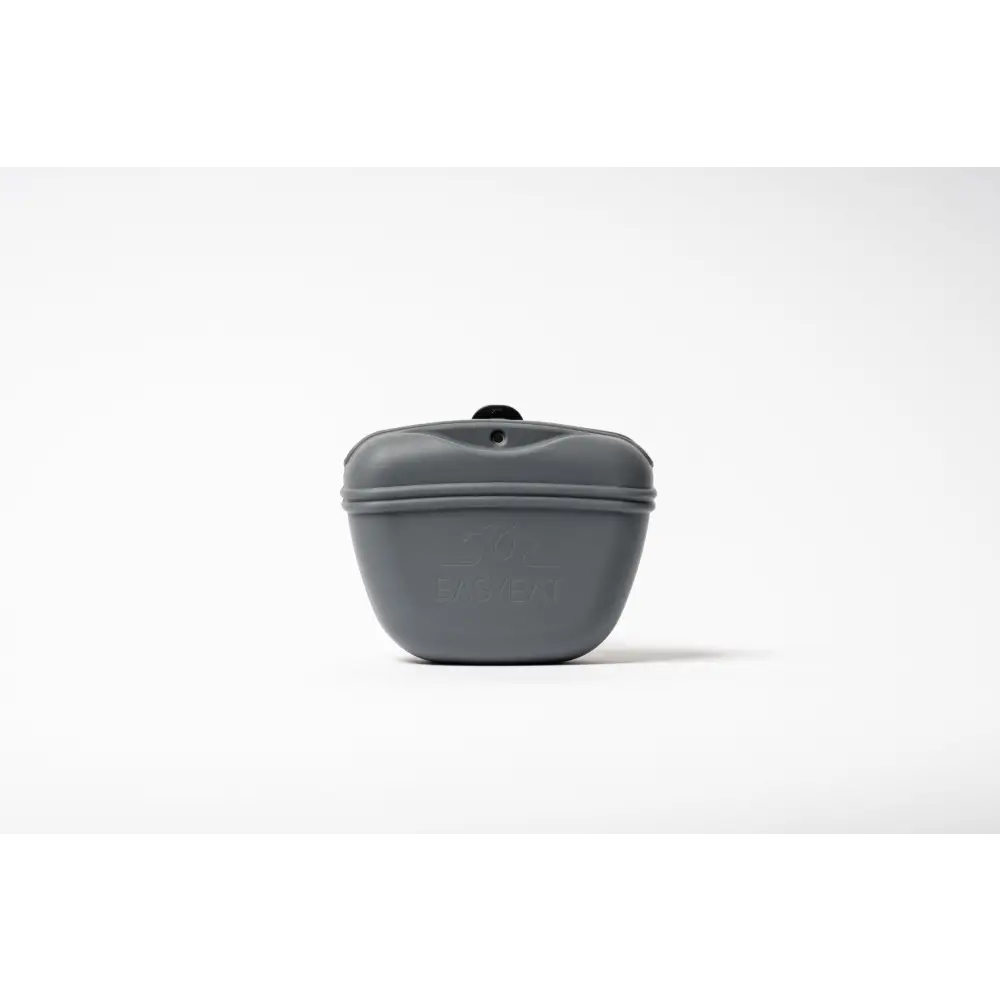 Gray silicone dog treat bag dispenser with black cap and embossed logo