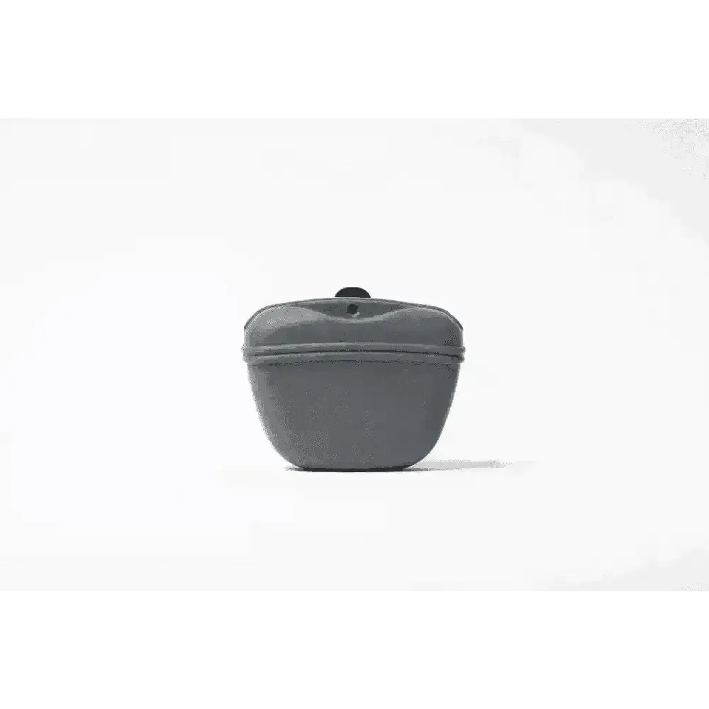 Gray silicone dog treat bag dispenser with black cap and embossed logo