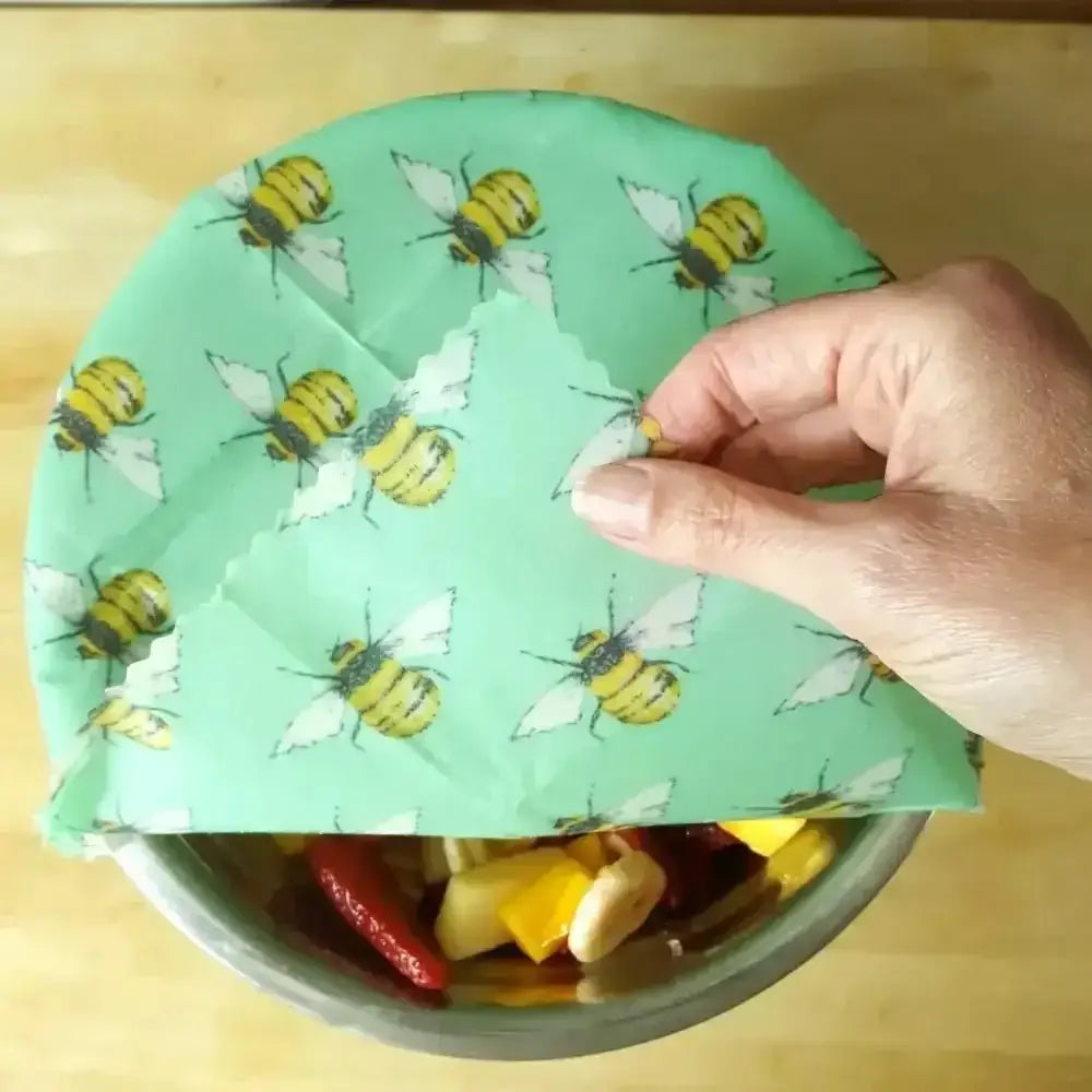Eco-friendly handmade organic beeswax wraps with green honey bee pattern by family business