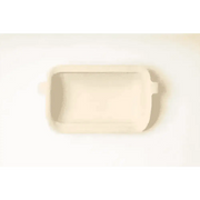Cream-colored ceramic baking dish for best dry dog food prep