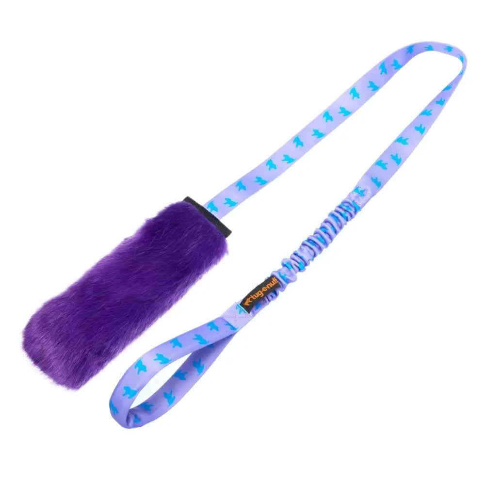 Purple fuzzy dog toy with lavender leash and blue paw prints