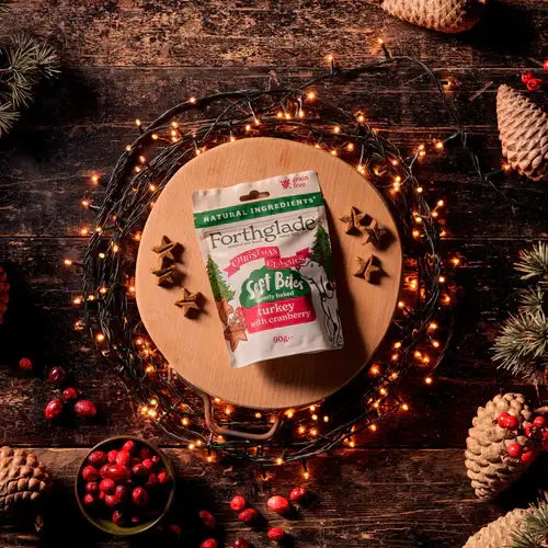 Forthglade pet food packet on a wooden board with festive decorations