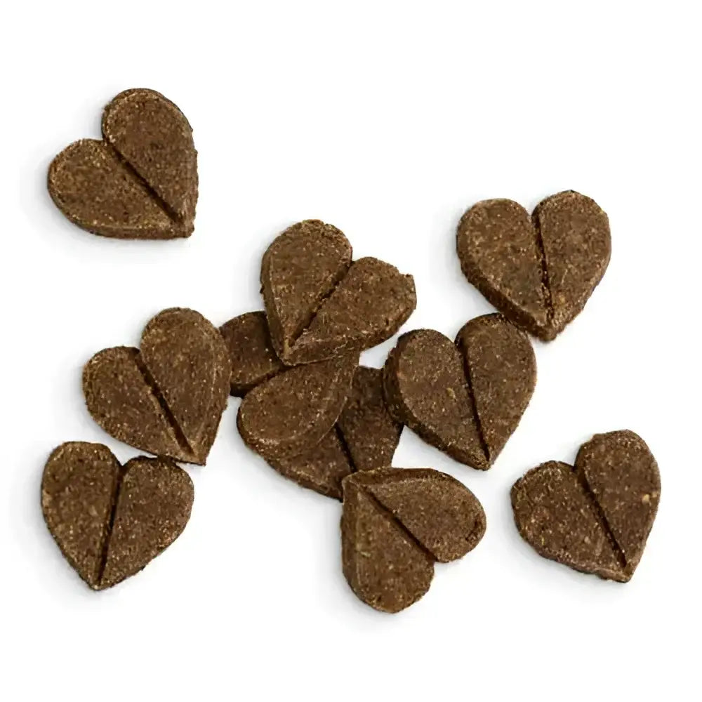 Heart-shaped soft bites dog treats with textured surface for canine companion begging