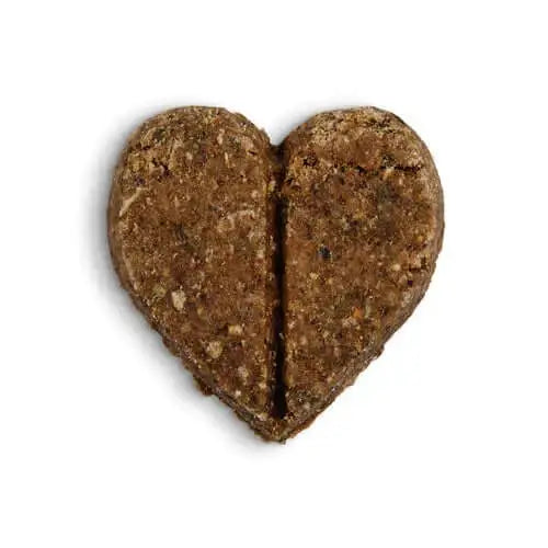 Heart-shaped Forthglade Soft Bites Treats Turkey with natural cat food, split in half