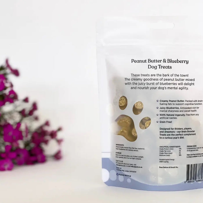 Pouch of Peanut Butter and Blueberry Dog Treats with text on a white background