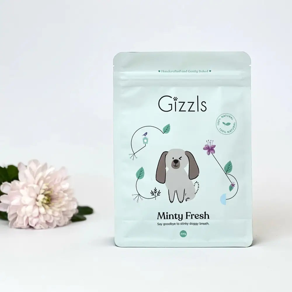 Gizzls minty fresh dog treats pouch with puppy and floral design