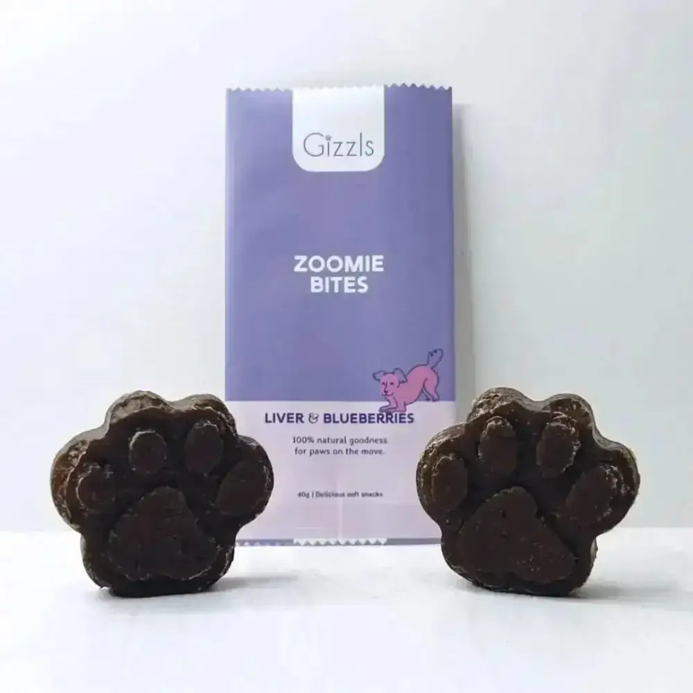 Gizzls Zoomie Bites dog treats with free-range ostrich liver and blueberries, paw-shaped