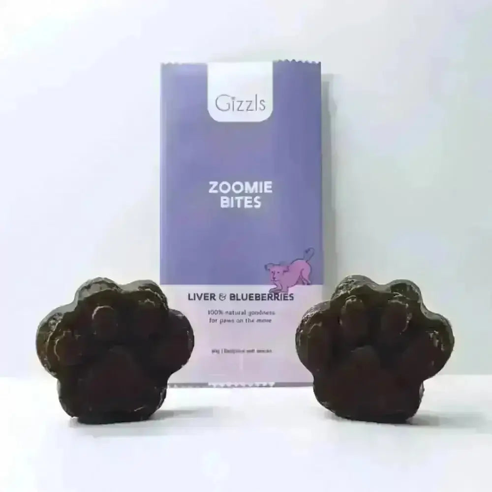 Gizzls Zoomie Bites dog treats with free-range ostrich liver and blueberries, paw-shaped