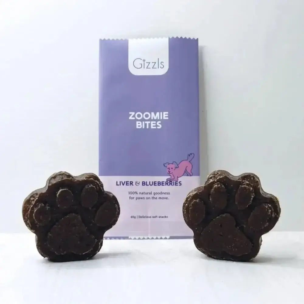 Gizzls Zoomie Bites dog treats with free-range ostrich liver and blueberries, paw-shaped