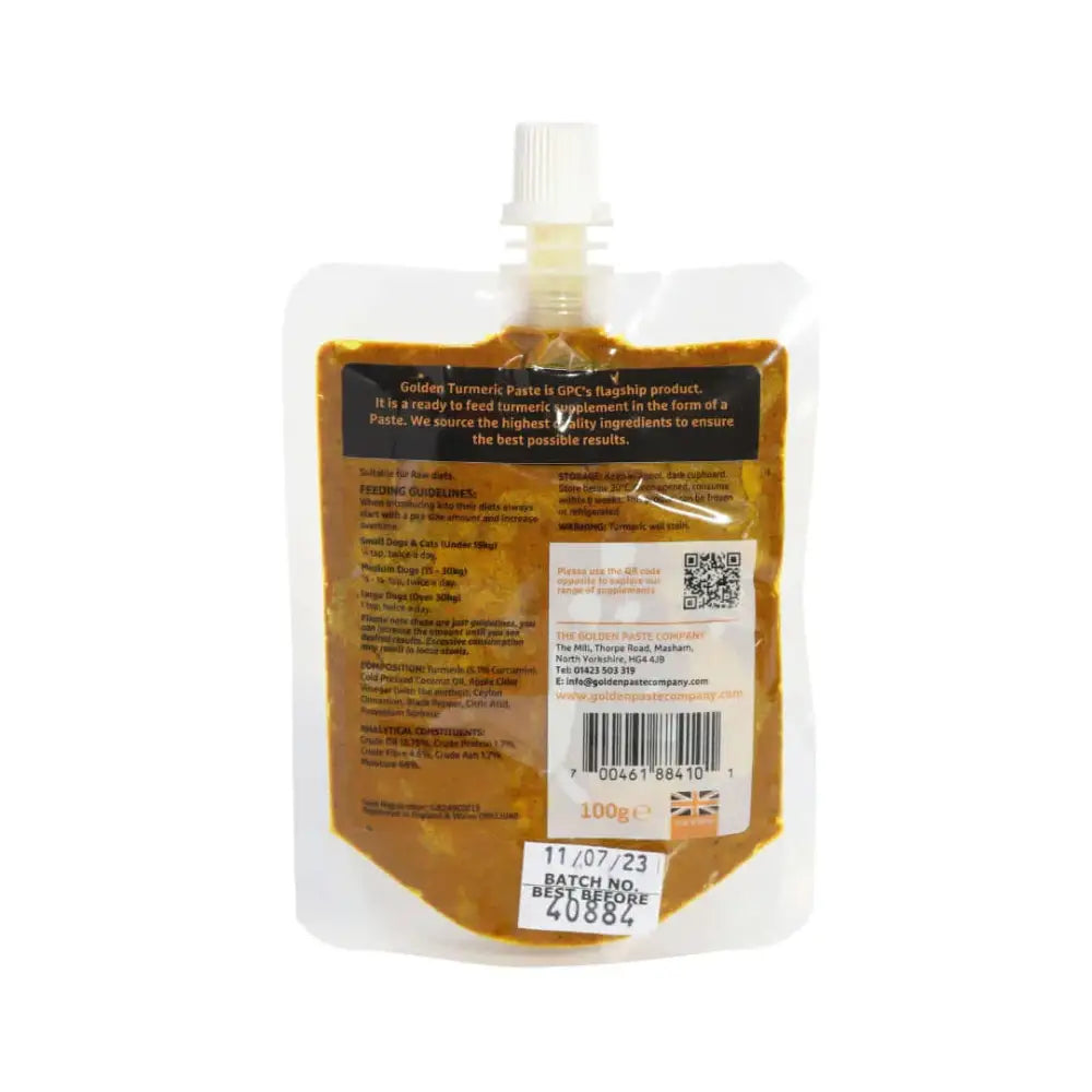 Golden paste for pets in clear pouch with white cap, contains turmeric and coconut oil