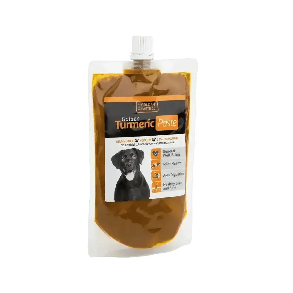 Golden Paste for Pets pouch with black dog illustration and white label design featuring turmeric and coconut oil