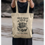 Cream-colored Gonzo Wild Tote bag with drive peace wild slogan and playful cat design