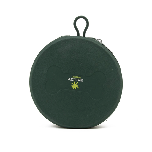 Green travel bowl sits on a white background