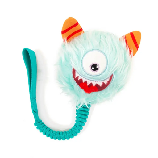 Toy with a single eye and striped ears on a white background
