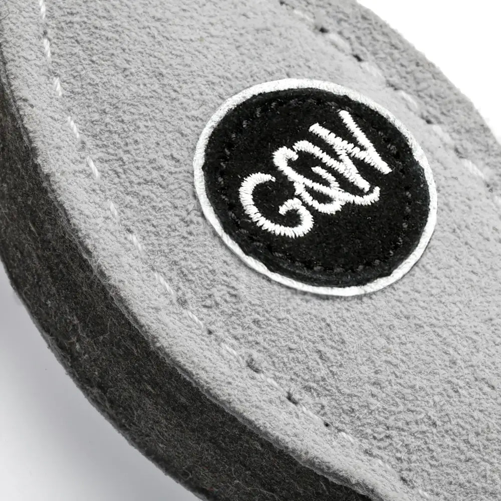 Gray fabric with a black and white patch displaying the word 'G&W'.