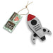 Rocket-shaped toy with 'It's Not Rocket Science' text and packaging labeled 'Eco Dog Toys'.