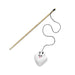 Cat toy with a catnip toy on a string attached to a wooden handle on a white background