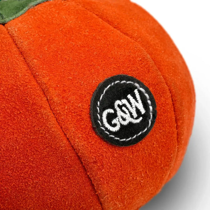Close-up of an orange plush toy with a 'G&W' patch on a white background