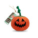 Plush pumpkin toy with a face, attached to a branch, on a white background