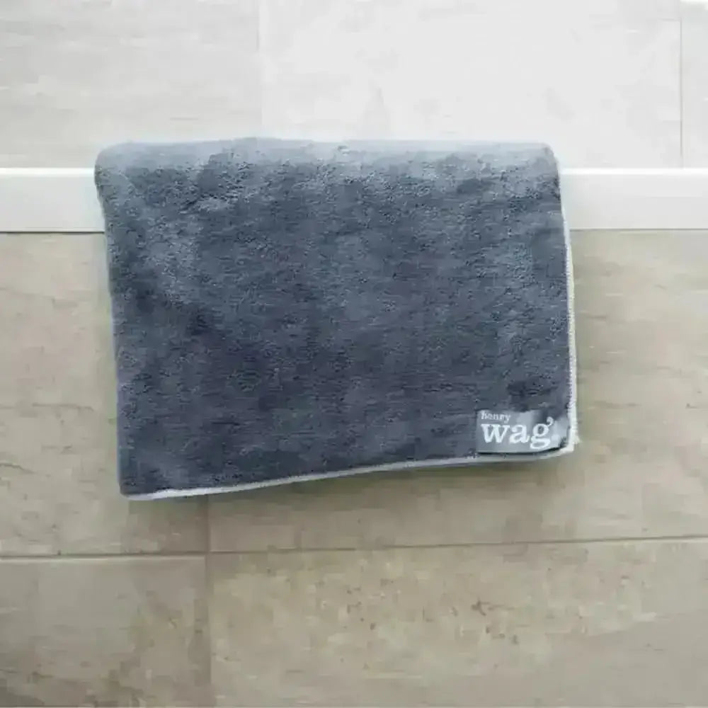 Henry Wag blue microfiber pet towel with Bare Wag logo for dog’s coat