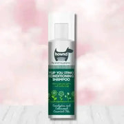Hownd Yup You Stink Conditioning Shampoo bottle with floral design and white cap, infused with cedarwood essential oils and fox poo scent