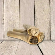 Bone-shaped dog chew toy with natural texture and beef tails filling from JR Pet Products