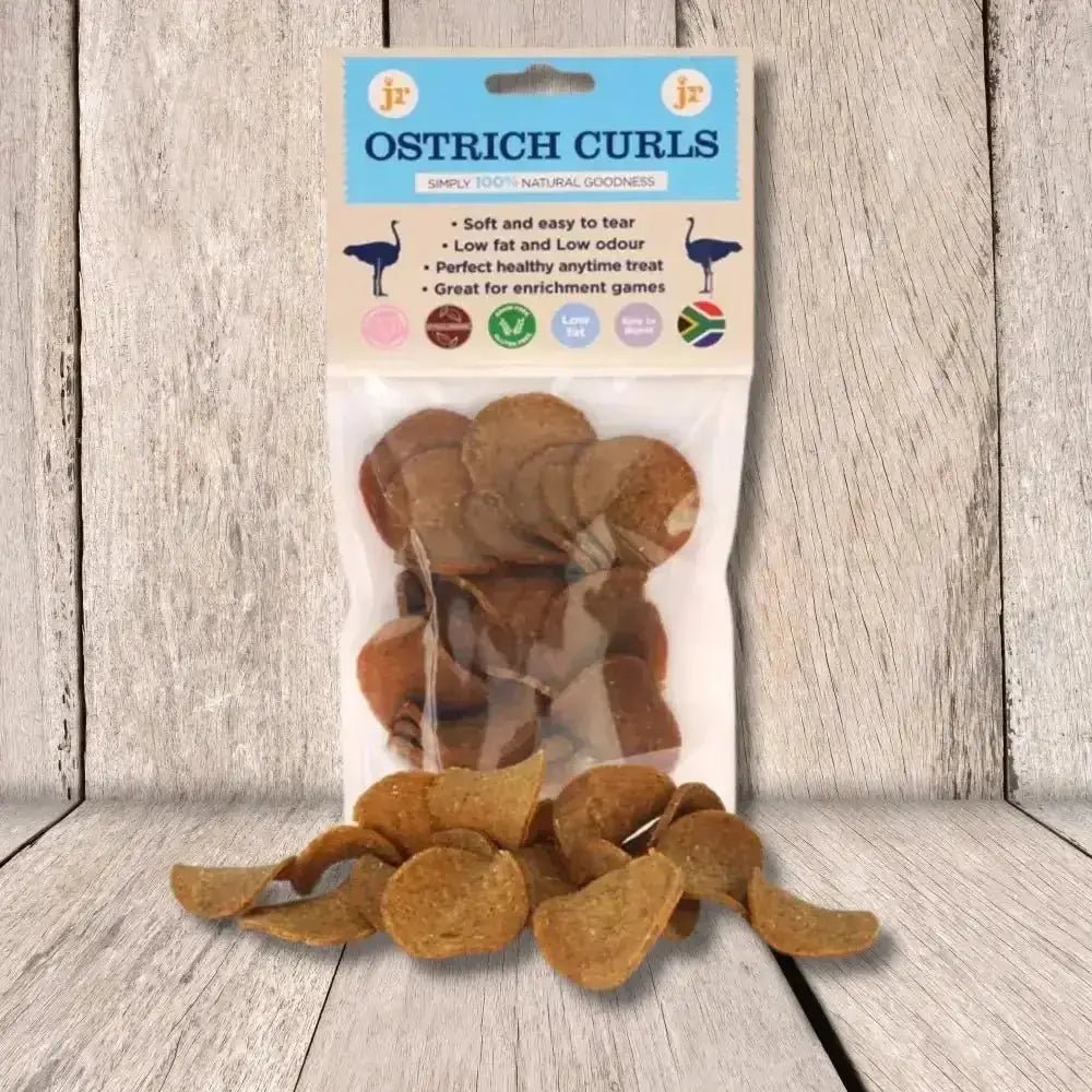 JR Pet Products Ostrich Curls dog treat bag with brown curled pieces