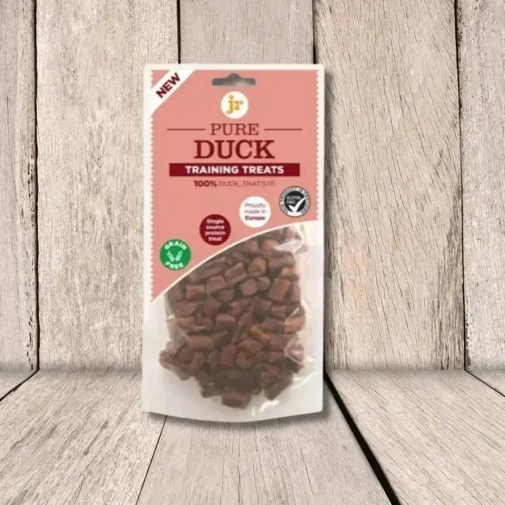 Pure Duck Training Treats bag with brown pieces inside from JR Pet Products