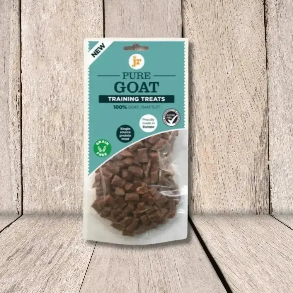 Pure goat training treats bag with teal label and brown contents from JR Pet Products