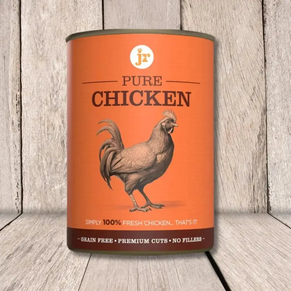 JR Pure Chicken Topper 400g: Orange canister with rooster, pure chicken topper for dogs
