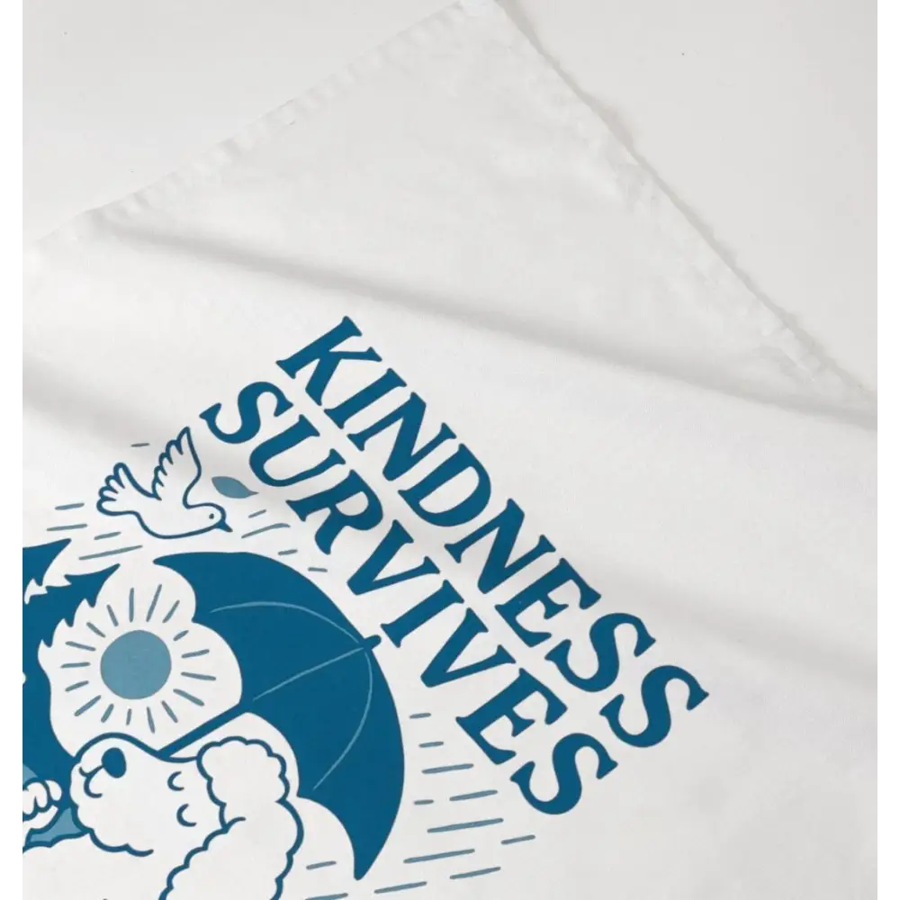 White organic cotton Kindness Survives tee with blue dove and flower graphic design