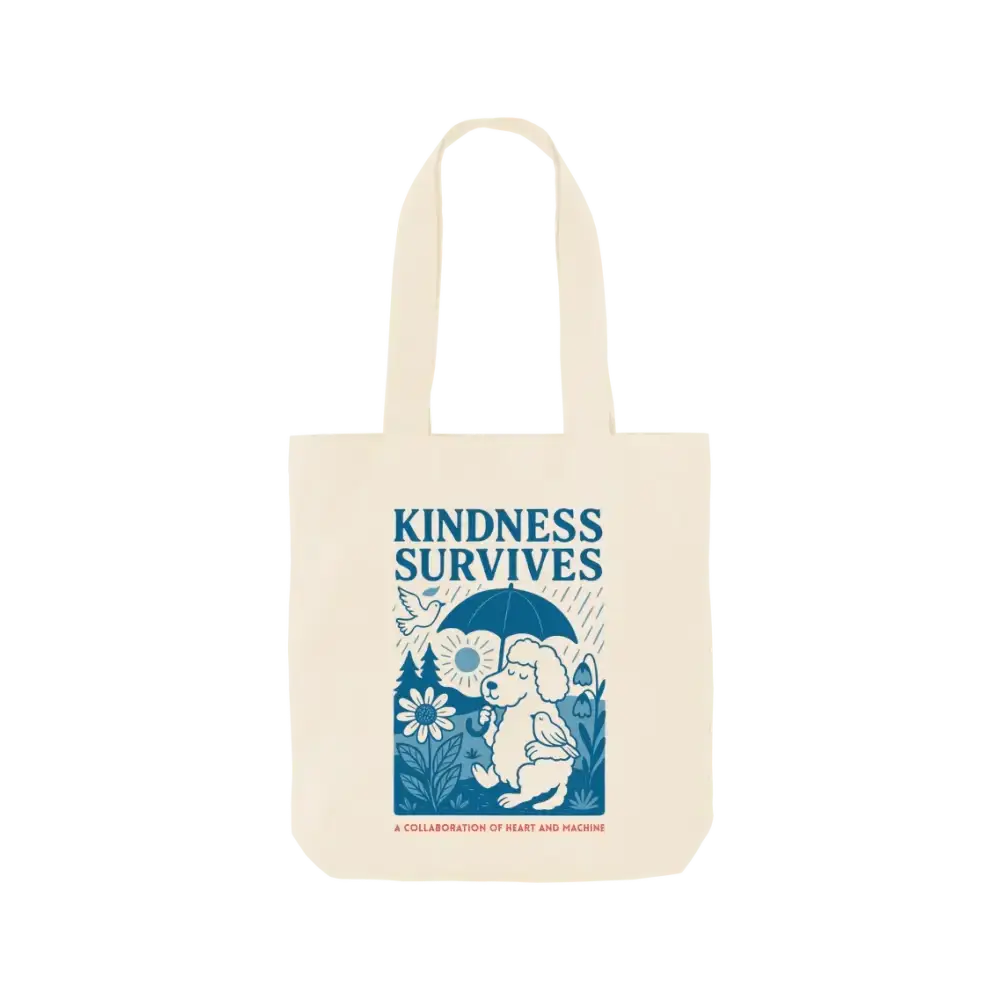 Cream-colored tote bag with blue elephant design and kindness survives message for natural cat treats