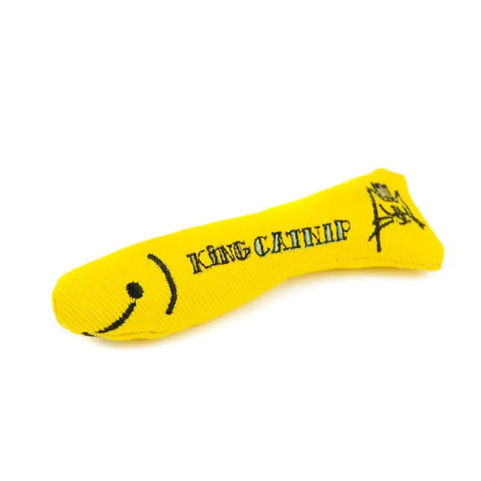 Yellow catnip toy with smiley face design on a white background