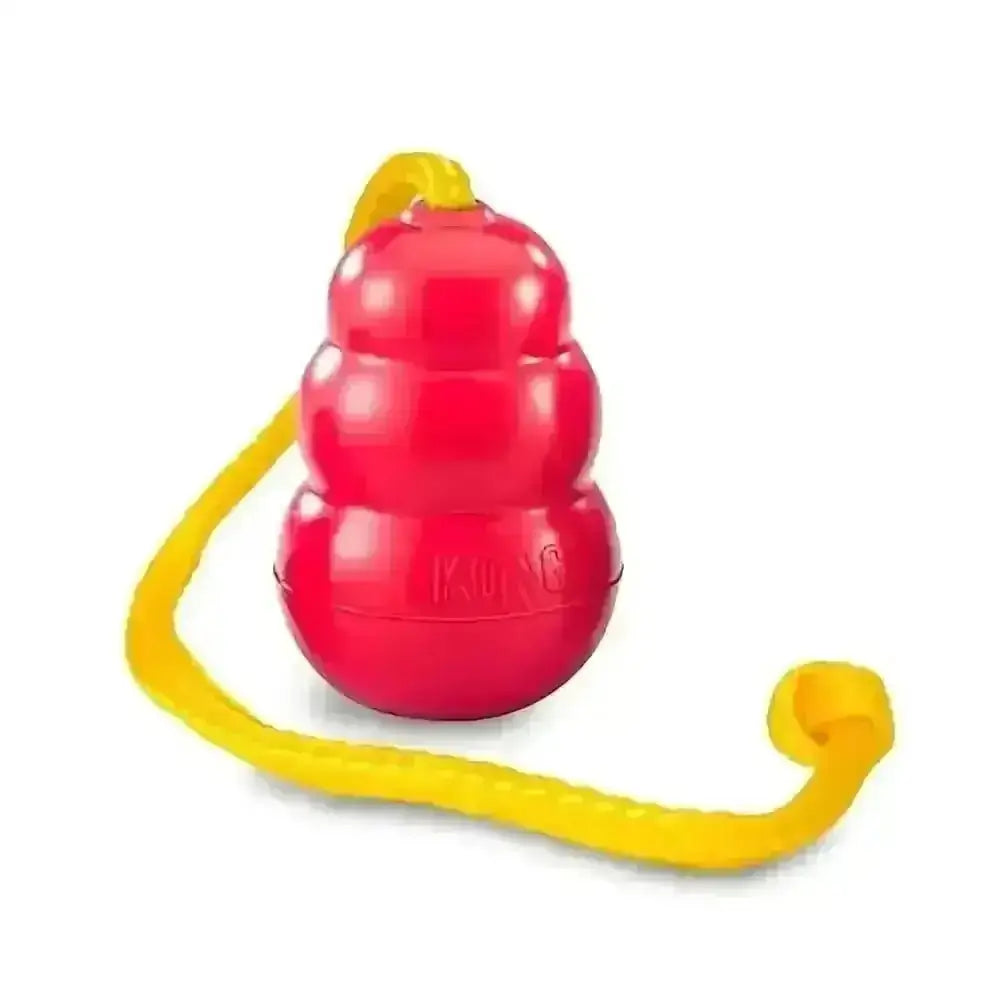 KONG Classic with Rope: Red toy with yellow rope, textured for grip, unpredictable bounce