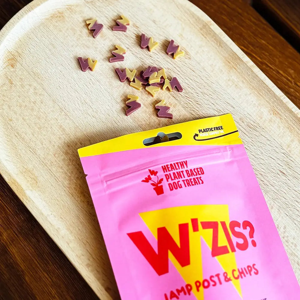 Pink and yellow Lamp Post & Chips pouch of plant-based dog treats with sweet potato and deliberately firm texture